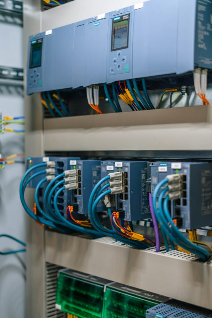 Industrial control panel with electronic modules and colorful wiring