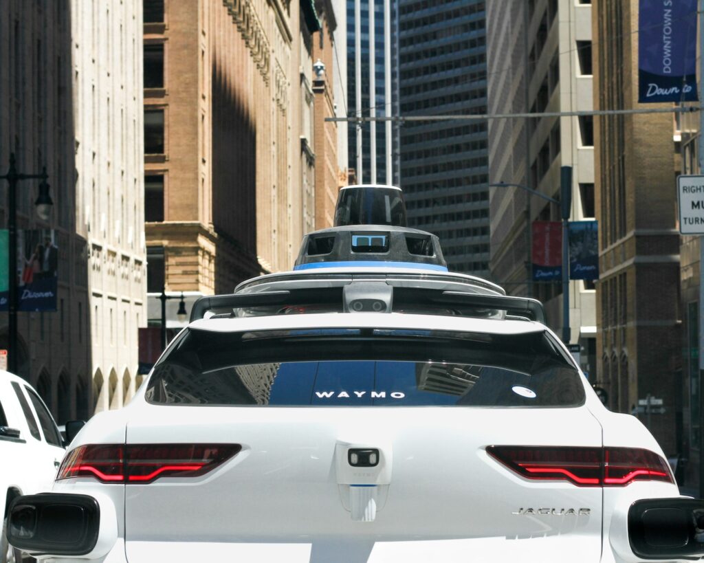 A car driving down a city street