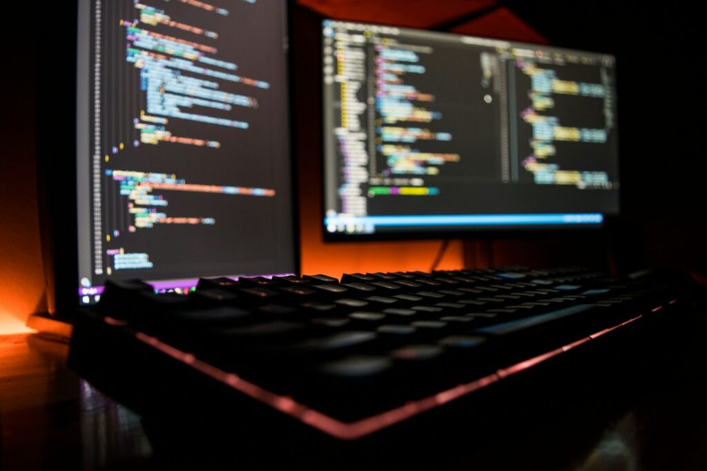 A black computer keyboard on a desk