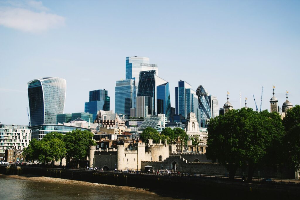 Modern skyscrapers rising behind historic buildings in London